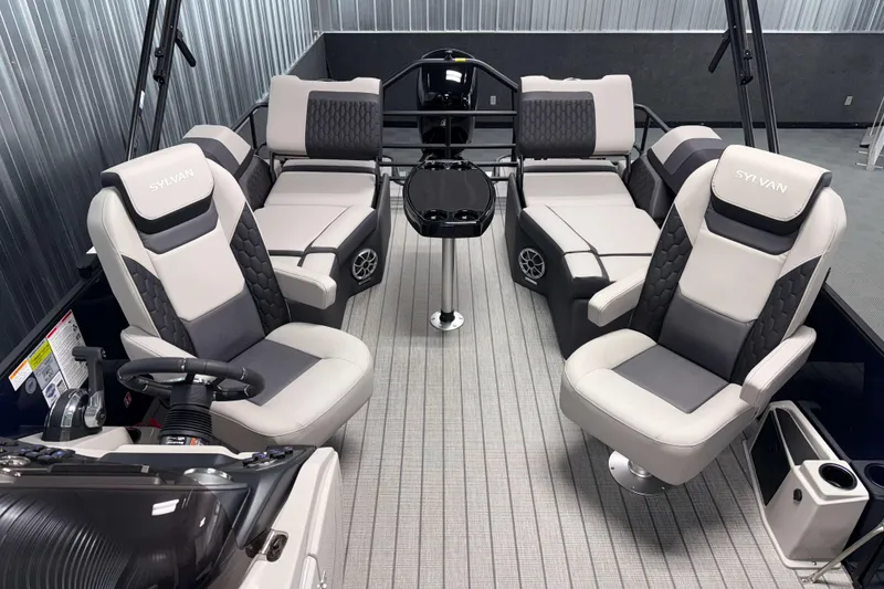 Slide: The Image of Luxurious interior of 2026 Sylvan L1 LZ pontoon boat with plush seating and modern design. - 15
