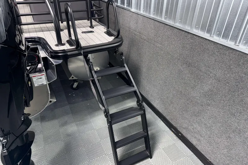 Slide: The Image of Staircase on a 2026 Sylvan L1 LZ boat, featuring sleek design and durable materials. - 28
