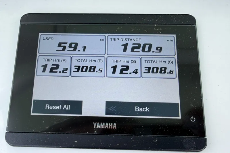 Slide: The Image of Yamaha display showing fuel usage and trip data for Sea Hunt Escape 27, 2021 model. - 4