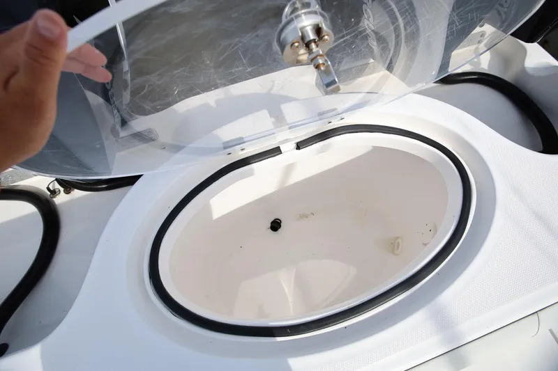 Slide: The Image of Open hatch on 2020 Invincible 35 Catamaran, showing interior compartment. - 16