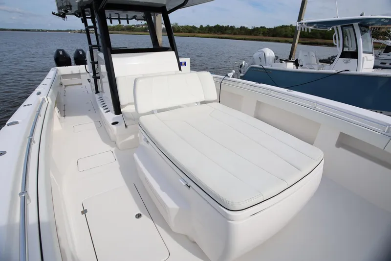 Slide: The Image of 2020 Invincible 35 Catamaran with spacious deck and comfortable seating on the water. - 29