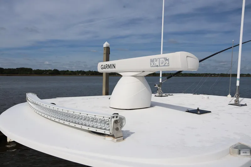 Slide: The Image of Radar and light bar on 2020 Invincible 35 Catamaran, featuring Garmin technology. - 39