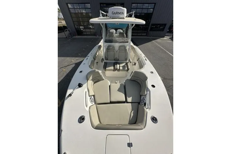 Slide: The Image of 2024 Key West 291 FS boat on trailer, front view, with Garmin equipment. - 11