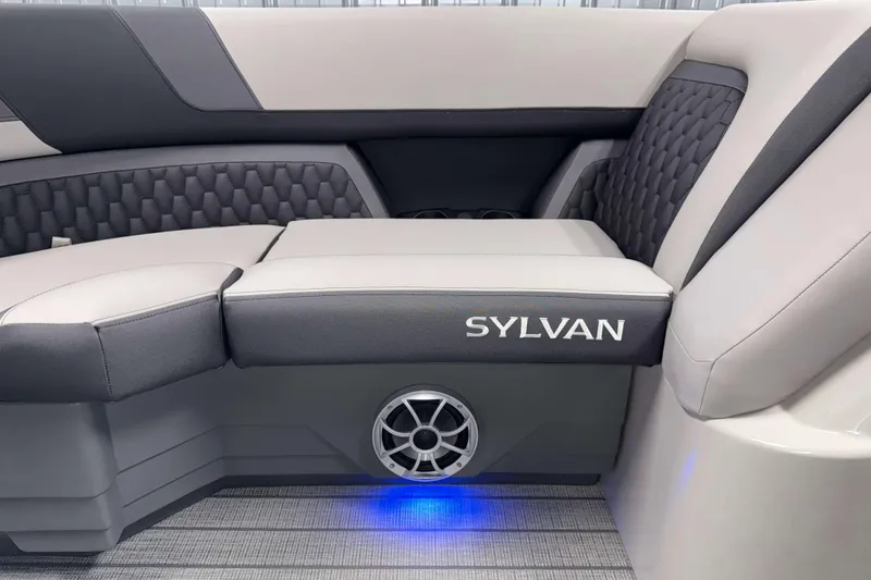 Slide: The Image of 2026 Sylvan L1 LZ boat interior with stylish seating and integrated speaker. - 22