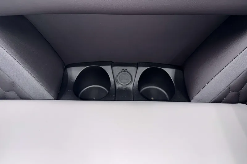 Slide: The Image of 2026 Sylvan L1 LZ interior cup holders and power outlet. - 23