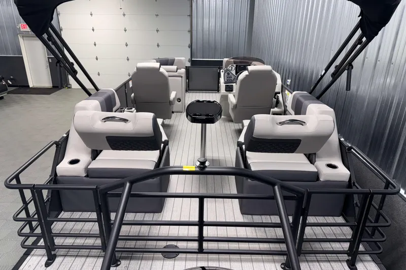 Slide: The Image of 2026 Sylvan L1 LZ pontoon boat interior with gray seating and modern design. - 3