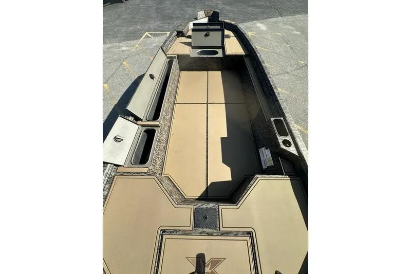 Slide: The Image of 2026 Xpress H18DB boat interior with storage compartments and seating area. - 5