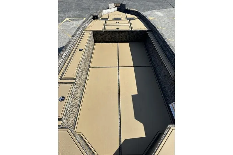 Slide: The Image of 2026 Xpress H18DB boat interior with spacious deck and storage compartments. - 6