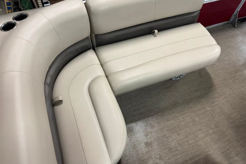 Slide: The Image of 2024 Sun Tracker Bass Buggy 16 XL Select boat seating, beige and gray upholstery. - 12