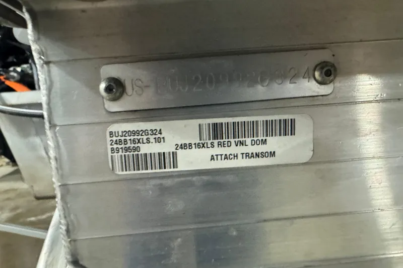 Slide: The Image of 2024 Sun Tracker Bass Buggy 16 XL Select transom with identification plate and barcode. - 14