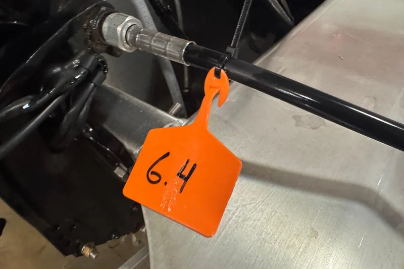 Slide: The Image of Close-up of a 2024 Sun Tracker Bass Buggy 16 XL Select component with an orange tag labeled "6.4". - 15