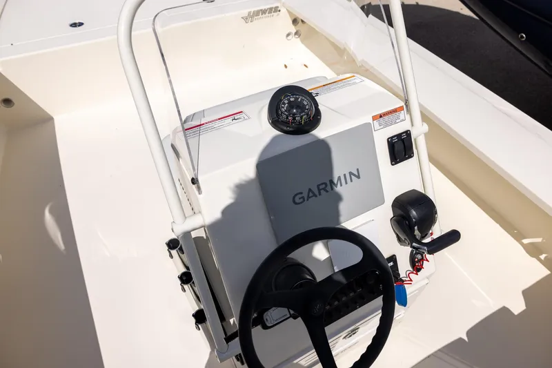 Slide: The Image of 2025 Hewes Redfisher 21 boat console with Garmin navigation system. - 6