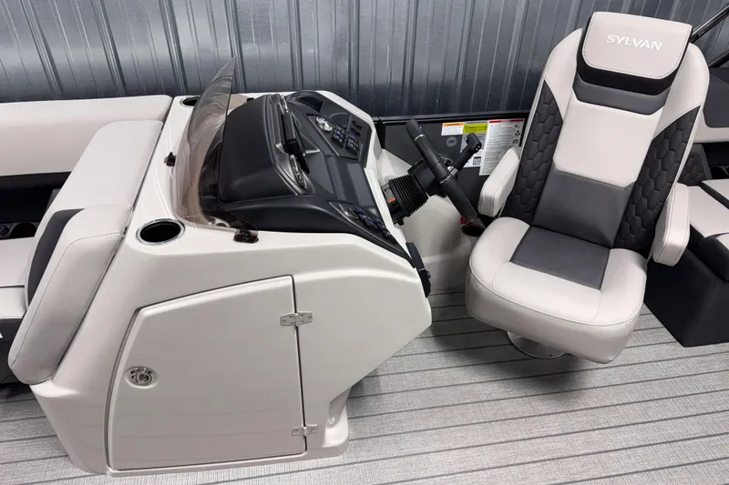 Slide: The Image of 2026 Sylvan L1 LZ boat interior with sleek helm and comfortable captain's chair. - 11
