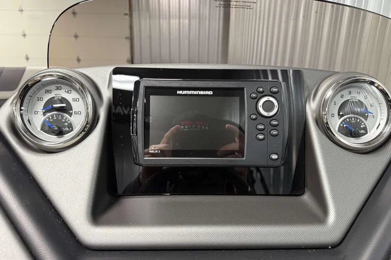 Slide: The Image of Dashboard of 2026 Sylvan L1 LZ with Humminbird Helix 5 GPS and gauges. - 14