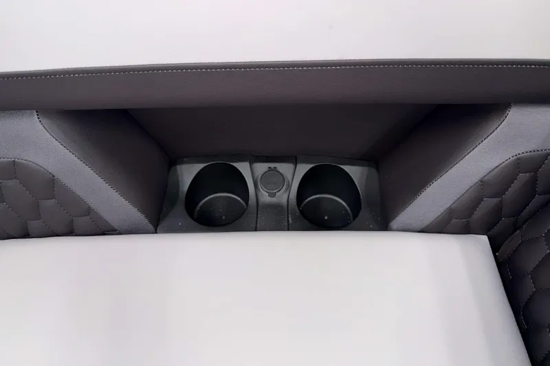 Slide: The Image of 2026 Sylvan L1 LZ interior cup holders with quilted upholstery. - 23