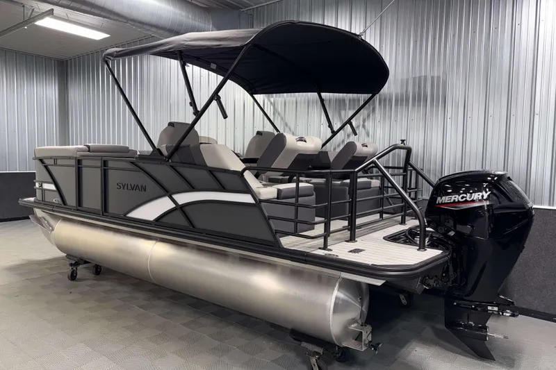 Slide: The Image of 2026 Sylvan L1 LZ pontoon boat with Mercury engine in a showroom. - 29