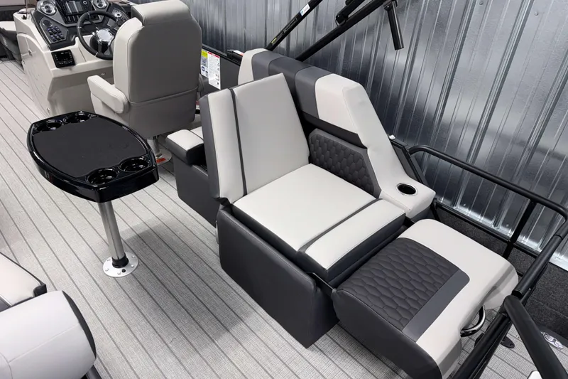 Slide: The Image of Luxurious interior of 2026 Sylvan L1 LZ boat with plush seating and sleek design. - 6
