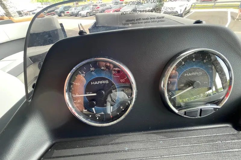 Slide: The Image of Dashboard of 2026 Harris Cruiser 210 SLDH with speedometer and tachometer. - 4