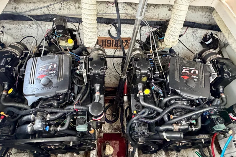 Slide: The Image of Twin MerCruiser 5.0 MPI engines in a 2006 Rinker 300 Express Cruiser. - 20