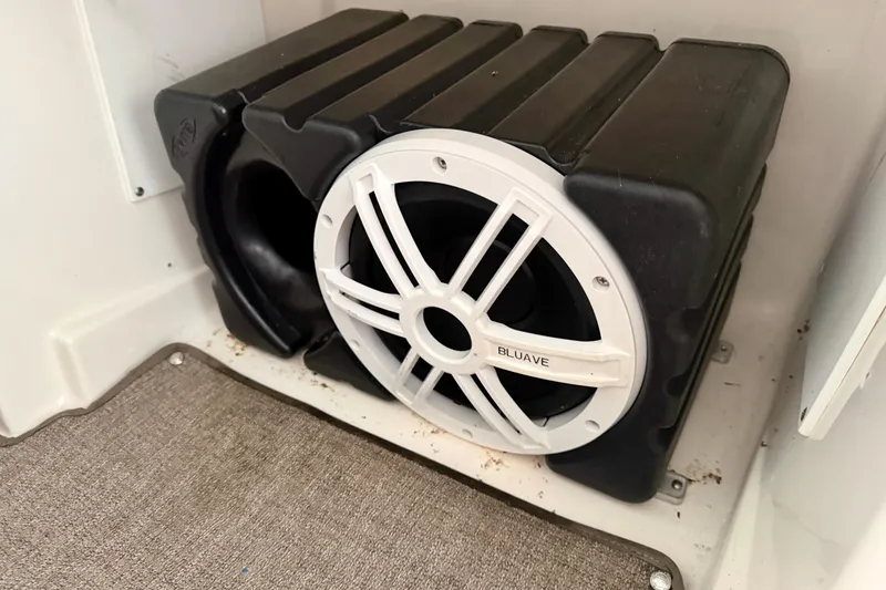 Slide: The Image of Speaker system in a 2006 Rinker 300 Express Cruiser boat interior. - 22