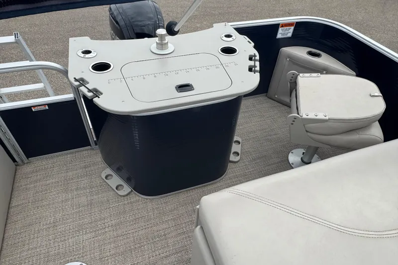 Slide: The Image of 2018 Bennington 22 SFX boat interior with fishing station and seating area. - 13