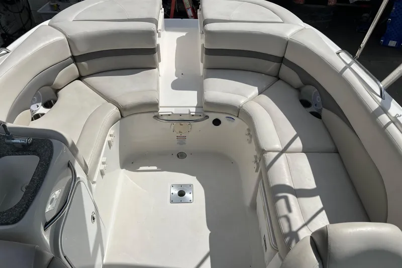 Slide: The Image of 2007 Chaparral 256 SSi boat interior with spacious seating and sleek design. - 5