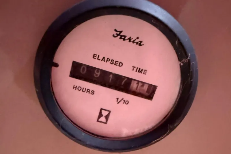 Slide: The Image of Faria elapsed time meter showing 917.1 hours on a 2009 Glastron GT 249. - 13