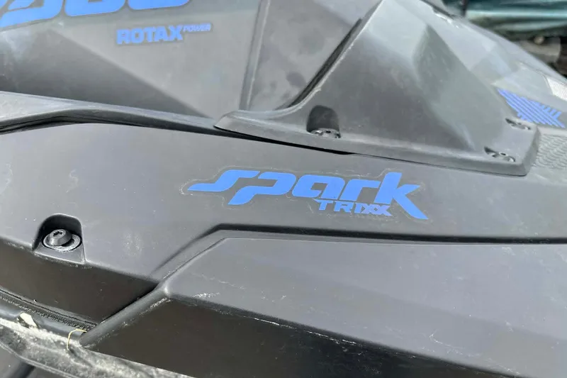 Slide: The Image of 2022 Sea-Doo Spark Trixx 2up jet ski with Rotax power branding. - 4