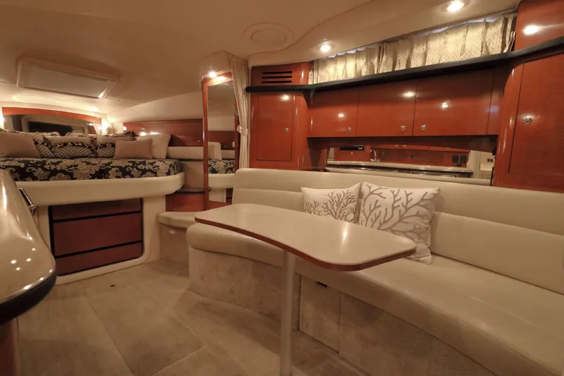 Slide: The Image of Luxurious interior of 2004 Sea Ray 340 Sundancer yacht with elegant seating and decor. - 11