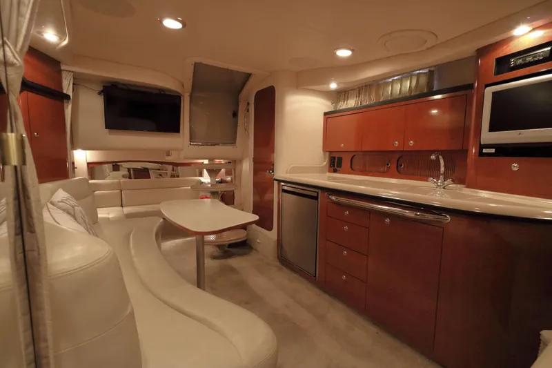 Slide: The Image of Luxurious interior of 2004 Sea Ray 340 Sundancer yacht with modern amenities. - 13