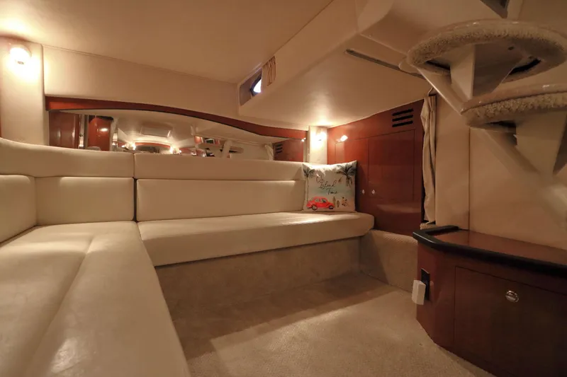 Slide: The Image of Luxurious interior of 2004 Sea Ray 340 Sundancer yacht with plush seating and elegant decor. - 15