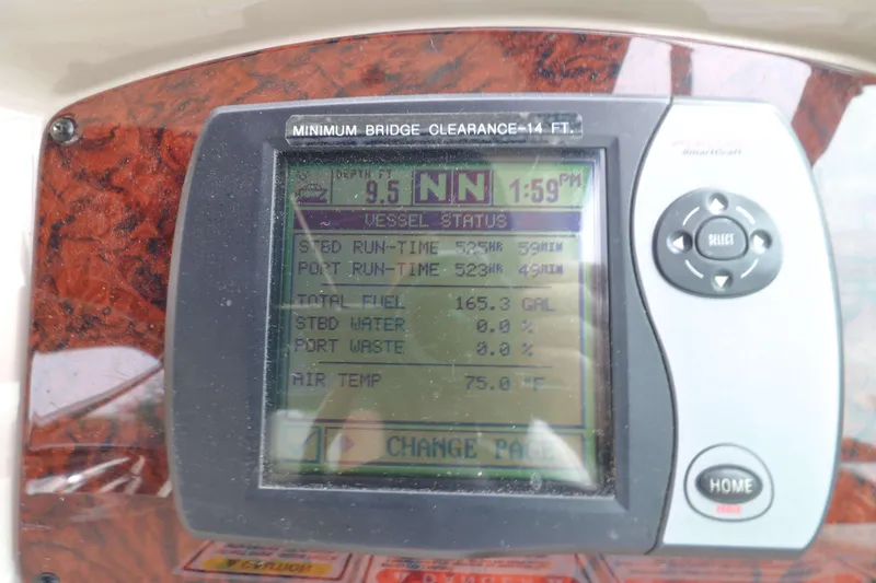 Slide: The Image of Close-up of a 2004 Sea Ray 340 Sundancer boat's control panel display. - 9