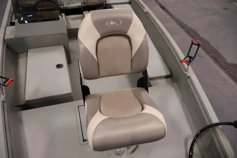 Slide: The Image of 2021 Polar Kraft Sportsman 1760 SE boat interior with cushioned seat and storage compartments. - 15