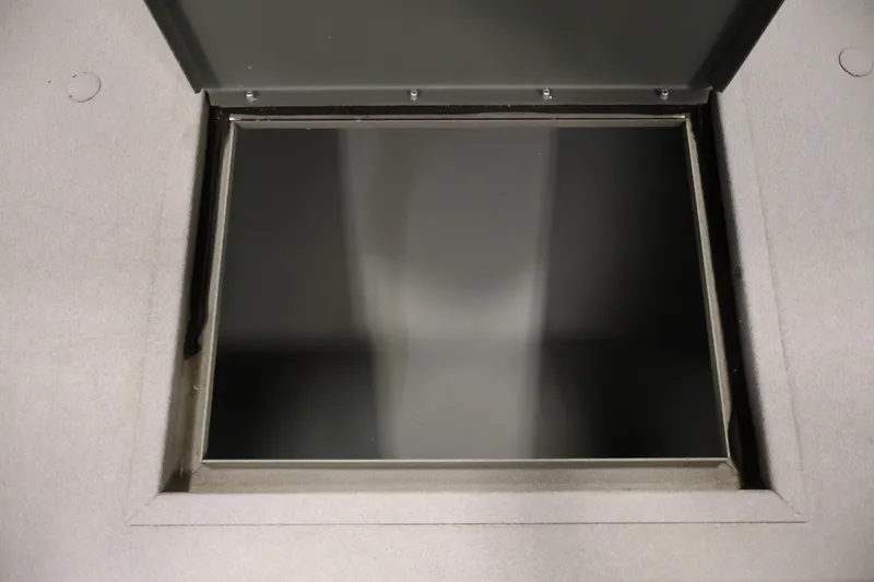 Slide: The Image of Open storage compartment on 2021 Polar Kraft Sportsman 1760 SE boat. - 18