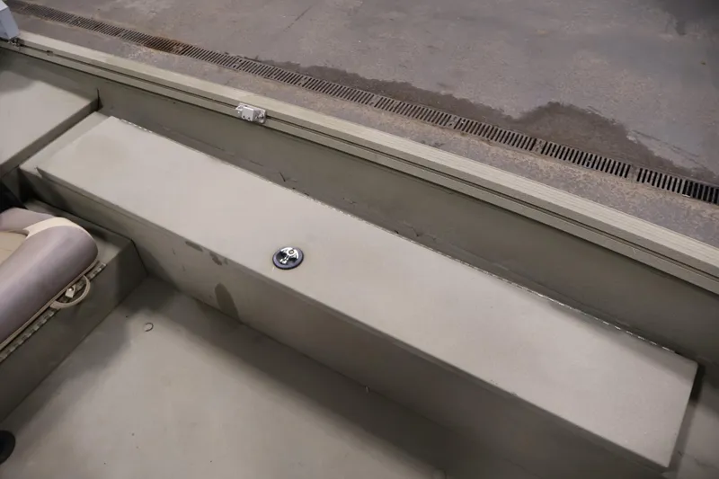 Slide: The Image of 2021 Polar Kraft Sportsman 1760 SE boat interior with seating and storage compartment. - 21