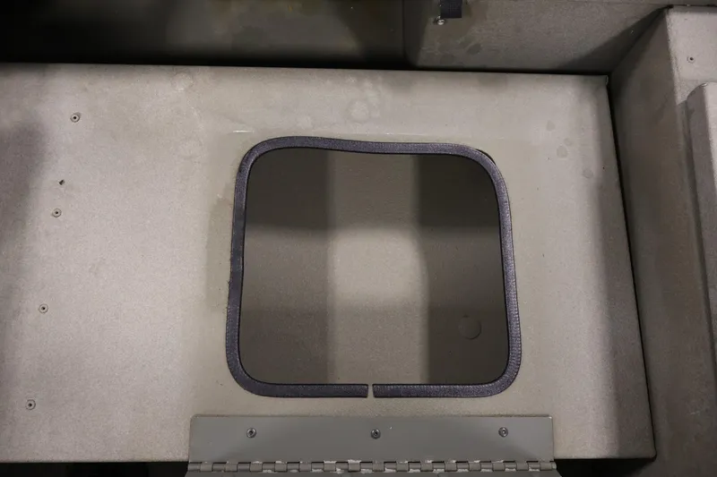 Slide: The Image of 2021 Polar Kraft Sportsman 1760 SE boat storage compartment. - 29