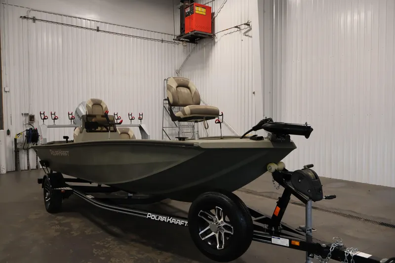 Slide: The Image of 2021 Polar Kraft Sportsman 1760 SE boat on trailer in indoor storage. - 3