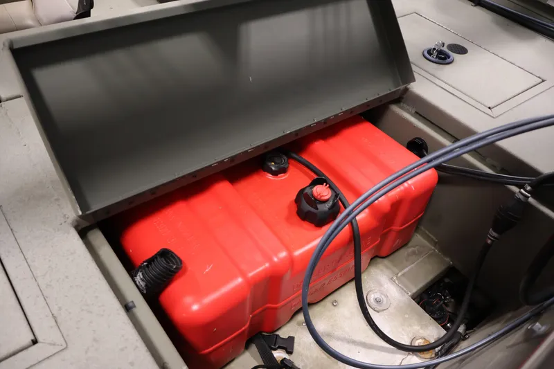 Slide: The Image of 2021 Polar Kraft Sportsman 1760 SE boat with red fuel tank compartment. - 36