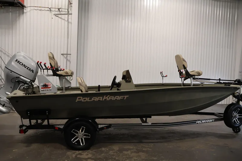 Slide: The Image of 2021 Polar Kraft Sportsman 1760 SE boat with Honda engine in a showroom. - 4