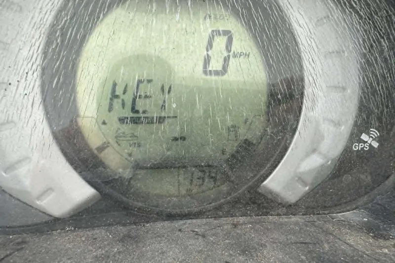 Slide: The Image of 2011 Sea-Doo GTI SE 155 dashboard displaying 0 MPH with GPS indicator. - 5