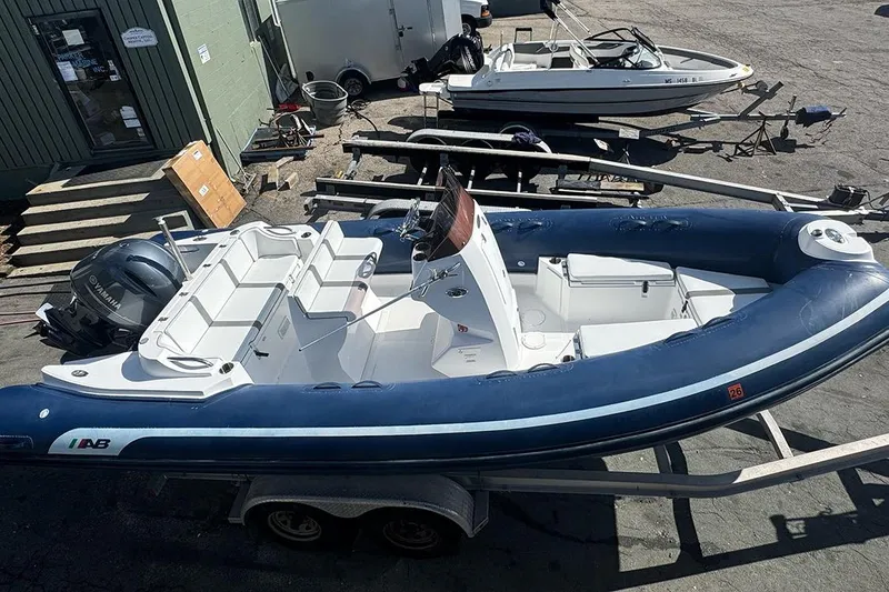 Slide: The Image of 2020 AB Inflatables Oceanus 21 VST boat on trailer, parked outdoors. - 12
