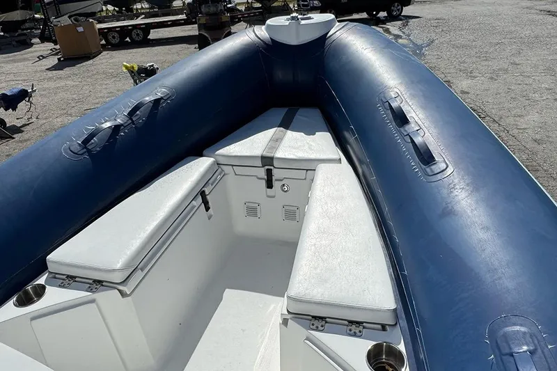 Slide: The Image of 2020 AB Inflatables Oceanus 21 VST boat interior with blue and white seating. - 13