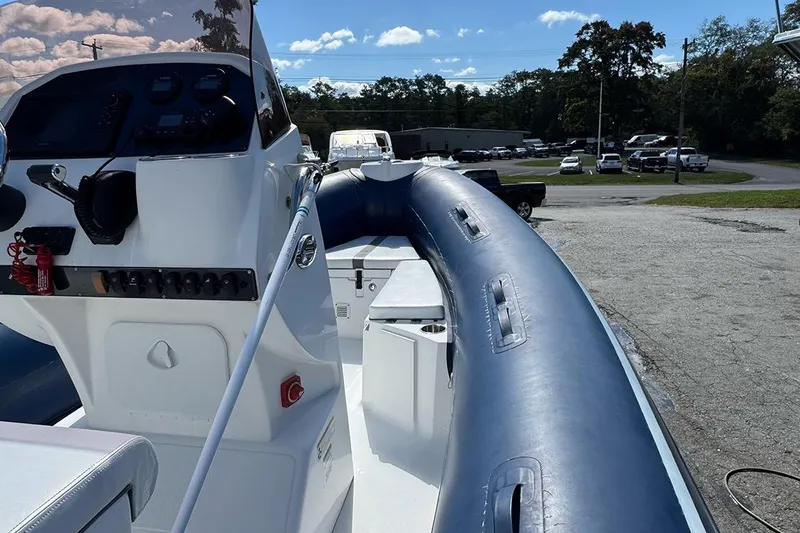 Slide: The Image of 2020 AB Inflatables Oceanus 21 VST boat with blue inflatable sides and control panel. - 15