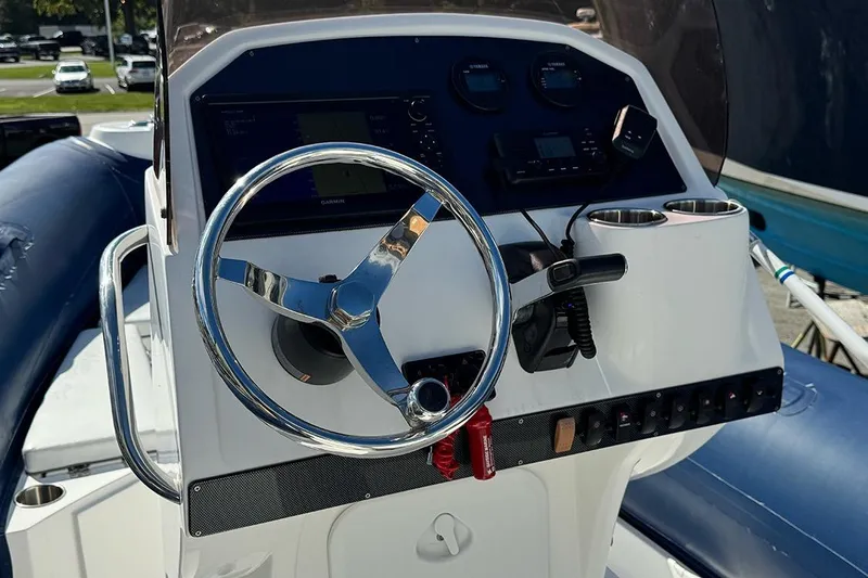 Slide: The Image of Control panel of 2020 AB Inflatables Oceanus 21 VST boat with steering wheel and gauges. - 16