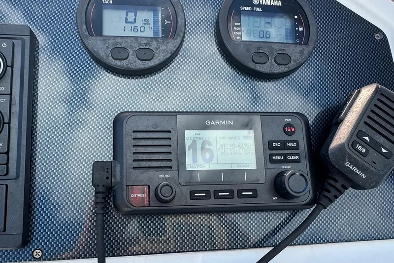 Slide: The Image of Garmin marine radio and Yamaha gauges on 2020 AB Inflatables Oceanus 21 VST dashboard. - 17