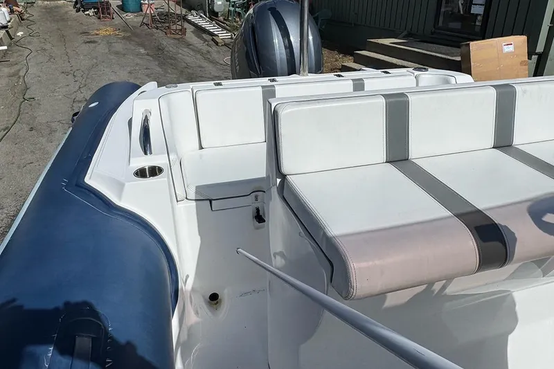 Slide: The Image of 2020 AB Inflatables Oceanus 21 VST boat interior with white and gray seating. - 29