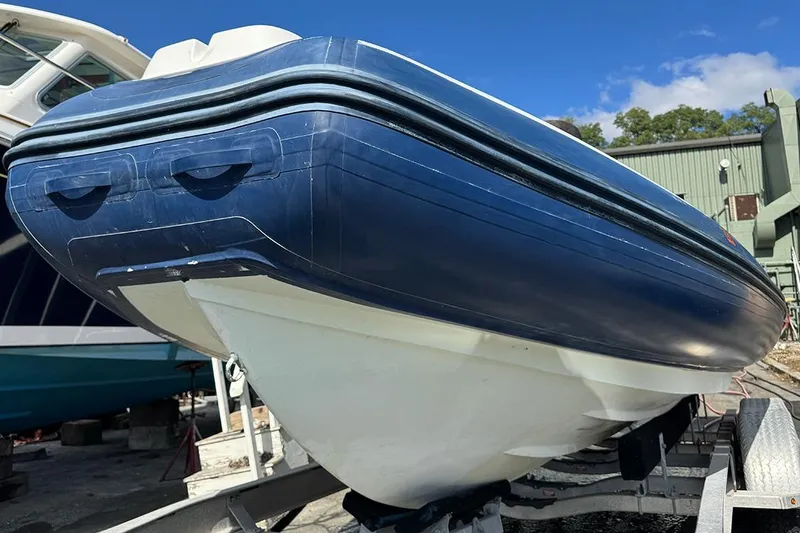 Slide: The Image of 2020 AB Inflatables Oceanus 21 VST boat on trailer, blue and white hull. - 3