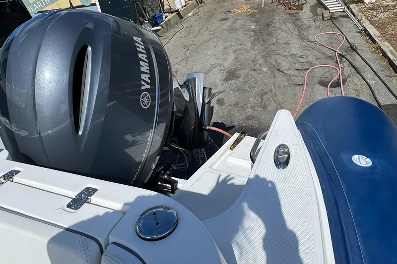 Slide: The Image of 2020 AB Inflatables Oceanus 21 VST with Yamaha outboard engine, docked on pavement. - 32