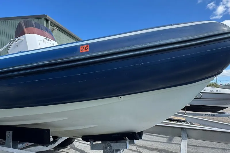 Slide: The Image of 2020 AB Inflatables Oceanus 21 VST boat on trailer, blue and white hull. - 6