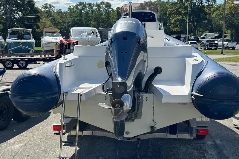 Slide: The Image of 2020 AB Inflatables Oceanus 21 VST boat with outboard motor, parked on a trailer. - 9